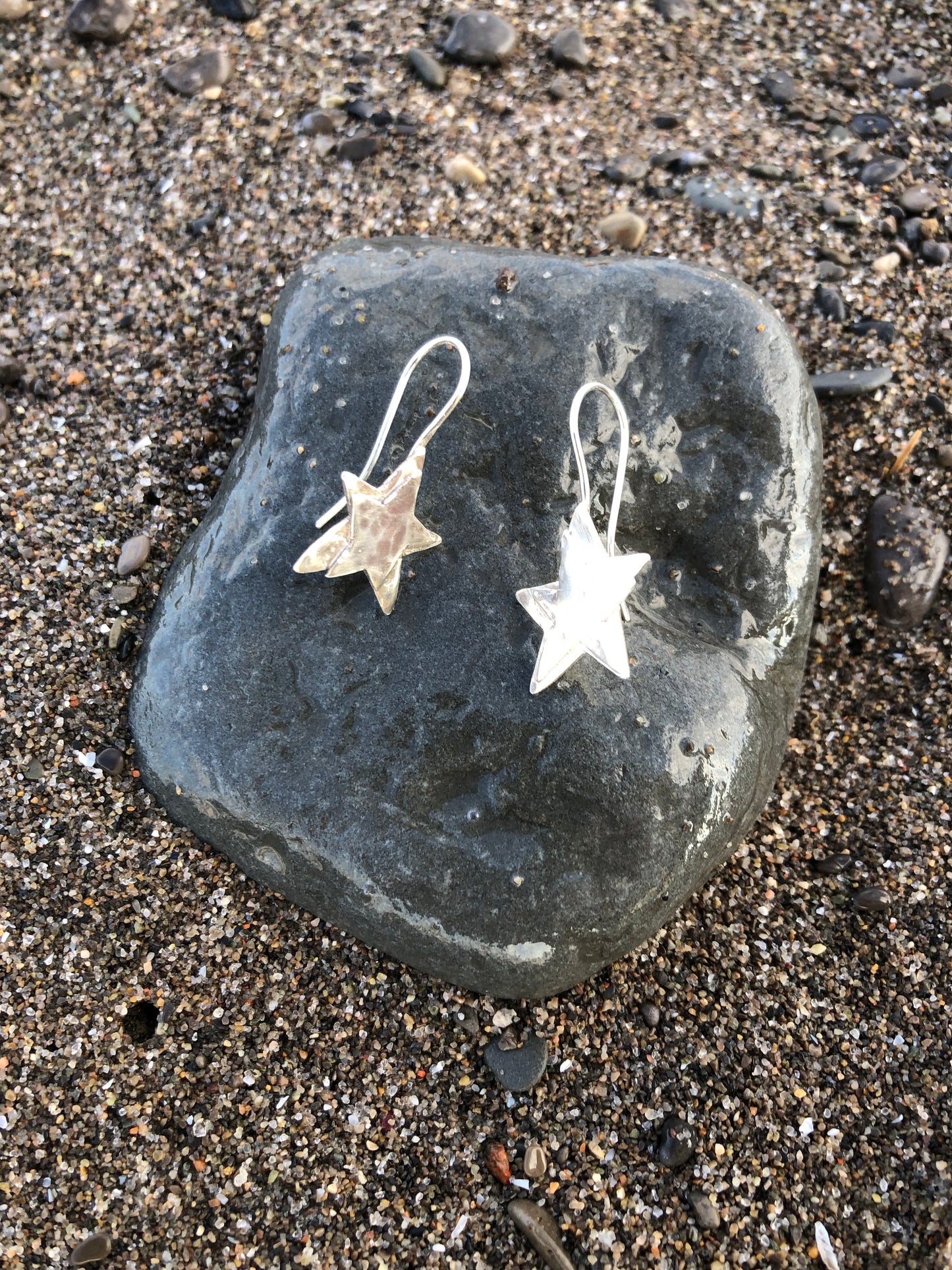 Spangly hammered silver star earrings