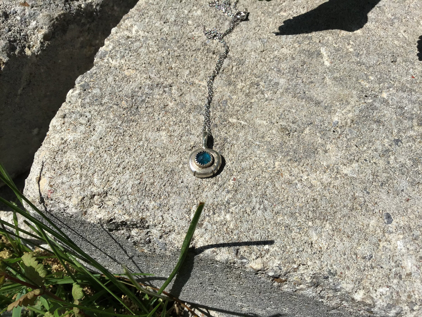 Melted recycled sterling silver and blue kyanite pendant