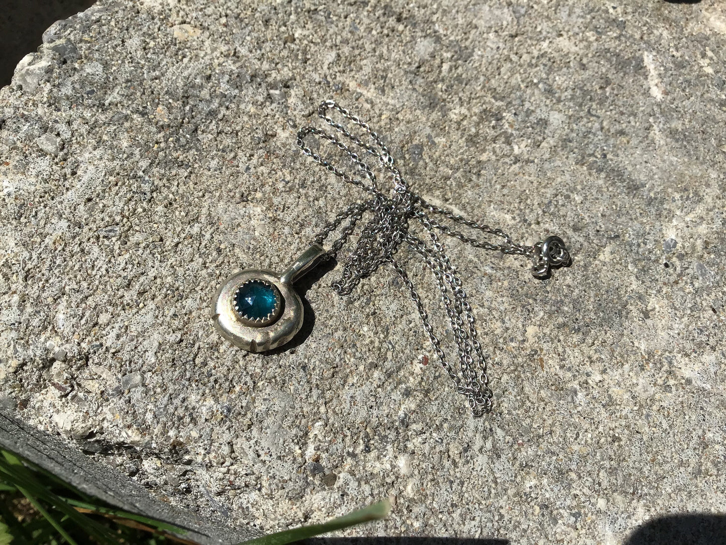 Melted recycled sterling silver and blue kyanite pendant